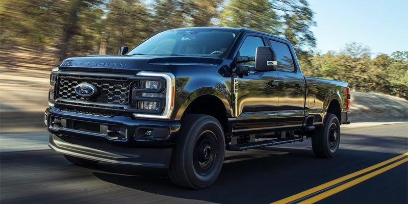 Ford F-250 Super Duty driving on a country highway