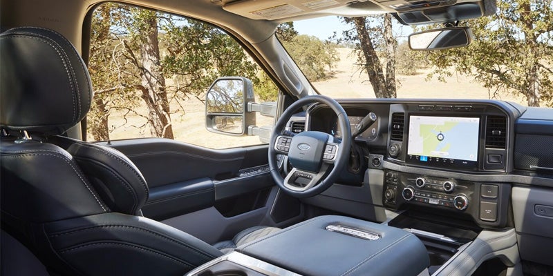 Ford Super Duty cabin with premium seating, large touchscreen infotainment system